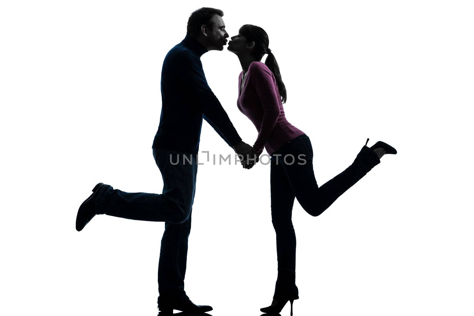 couple woman man lovers kissing   silhouette by PIXSTILL