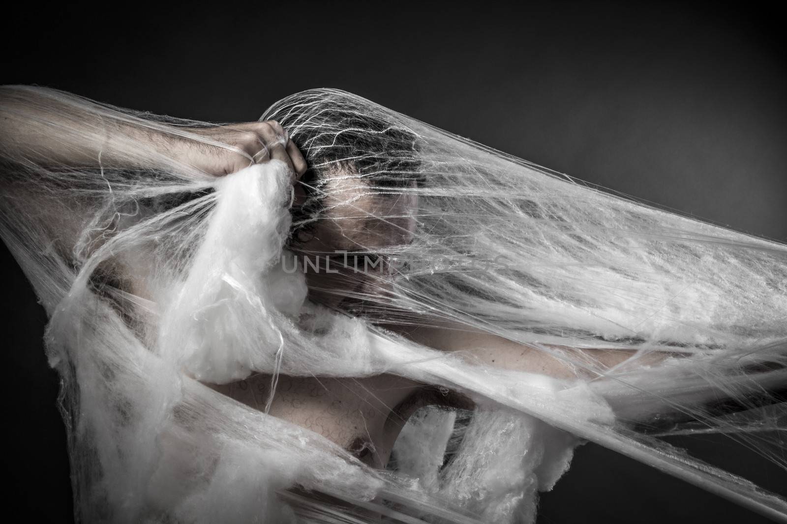 Danger.man tangled in huge white spider web by FernandoCortes