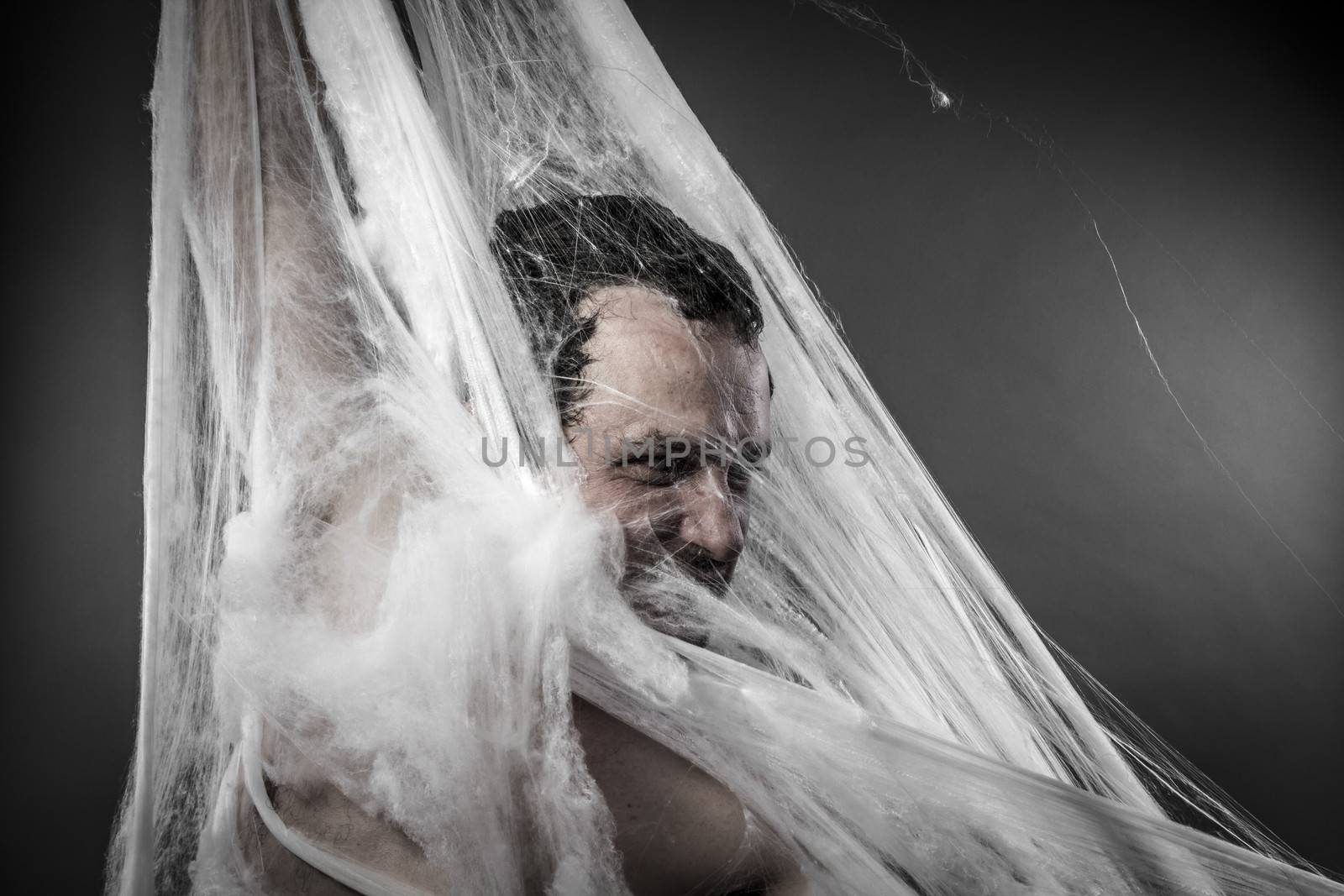 Night.man tangled in huge white spider web by FernandoCortes