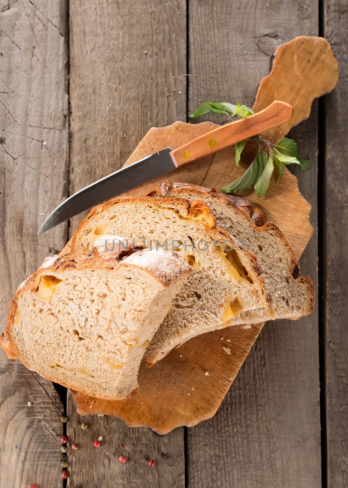 Bread and knife on a cutting board