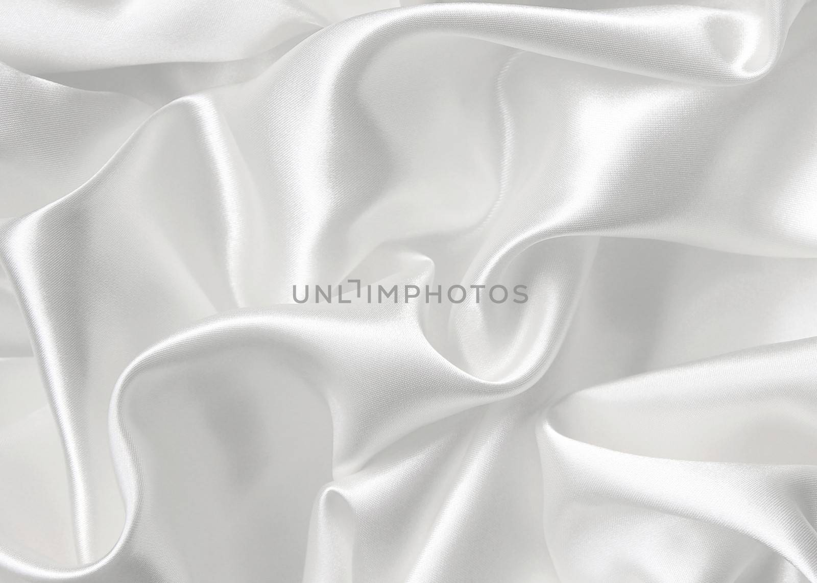 Smooth elegant white silk can use as wedding background 