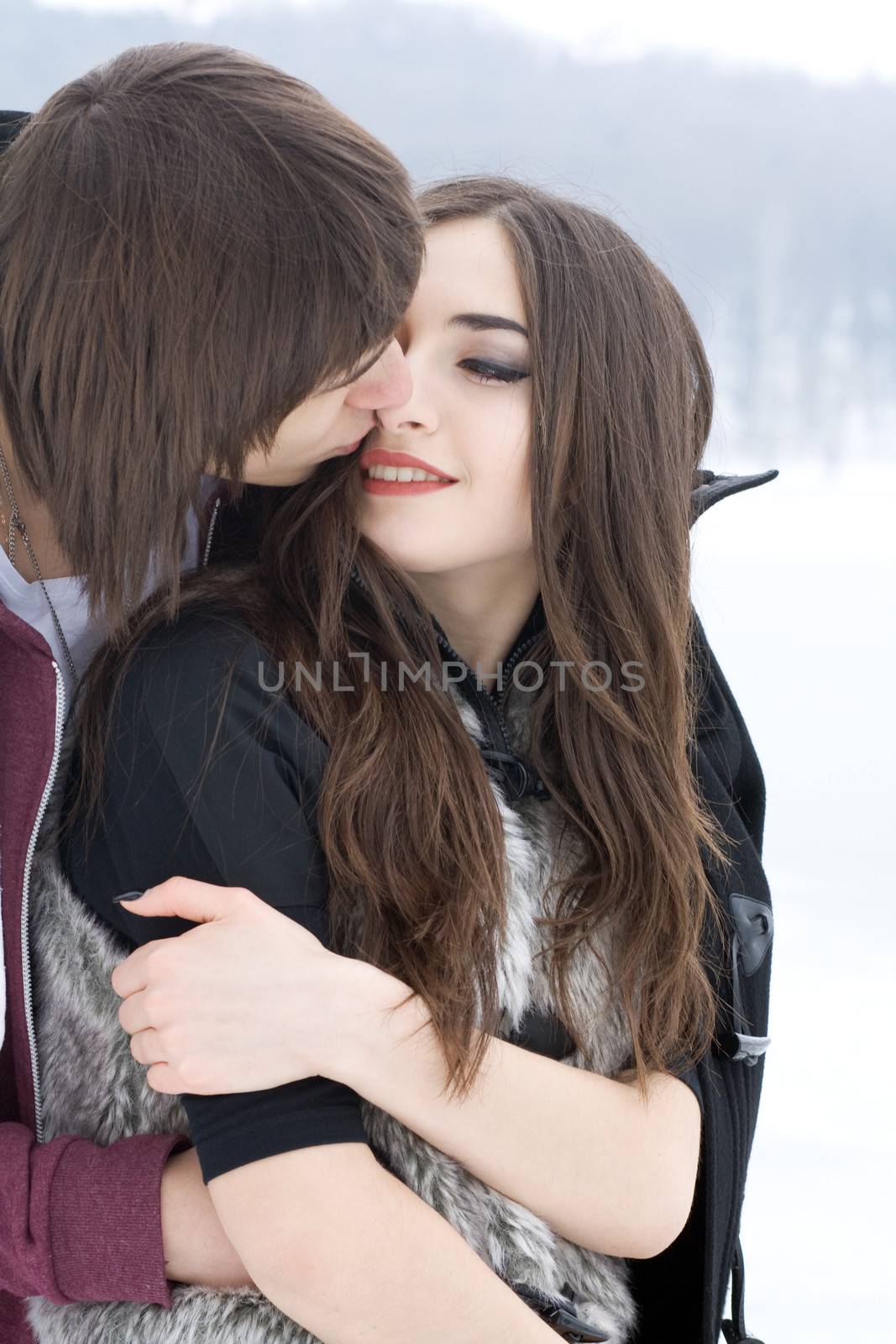  Romantic young couple kissing  by Irina1977