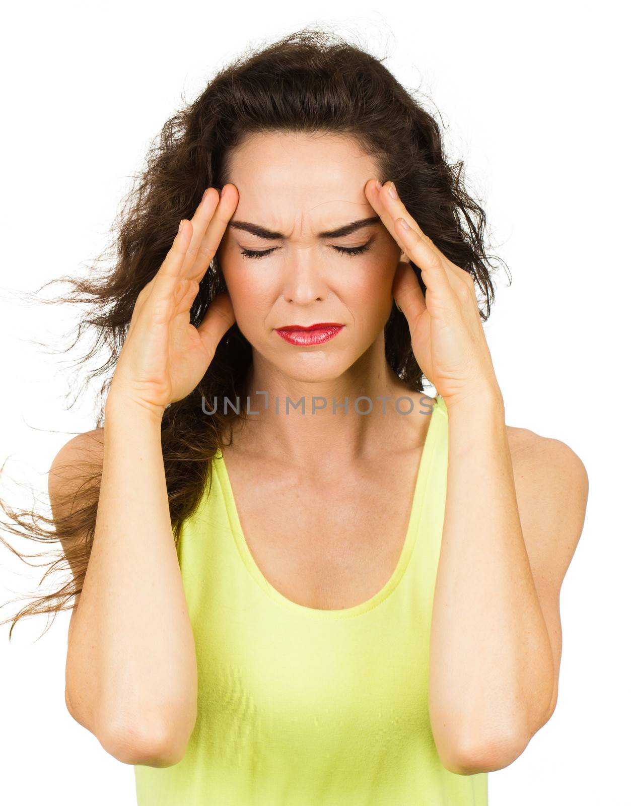 A woman with a bad headache or migraine. Isolated on white.