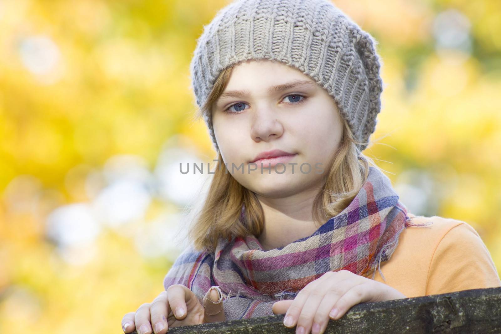 young girl in the autumn park - portrait by miradrozdowski