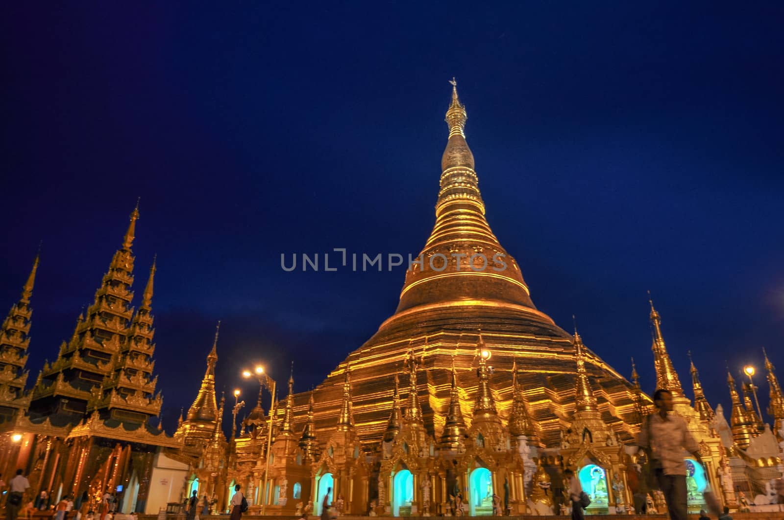 Shwedagon Pagoda in Yangon City, Burma with Beautiful Night Light: the beautiful golden pagoda, the oldest historical pagoda in Burma and the world, in the evening with great evening light.