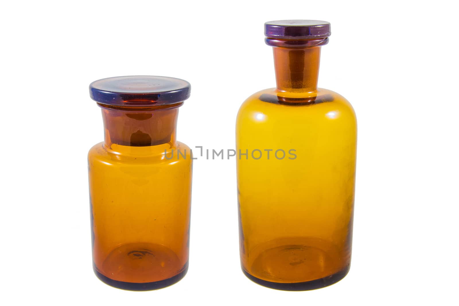 Glass pharmacy containers isolated on white