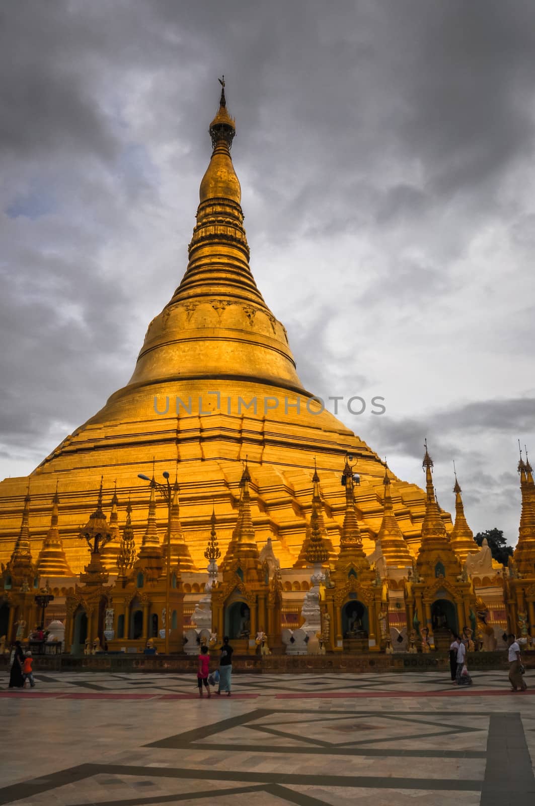 Shwedagon Pagoda Temple shining in the beautiful sunset in Yango by weltreisendertj