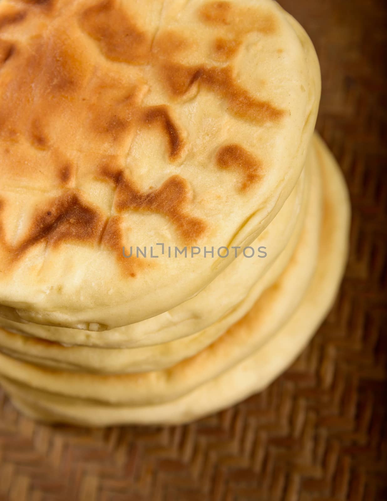 Nepalese bread on wooden background