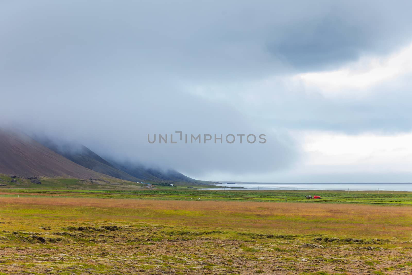 Cloudy sky over the coast in the East Fjords Iceland. Panorama