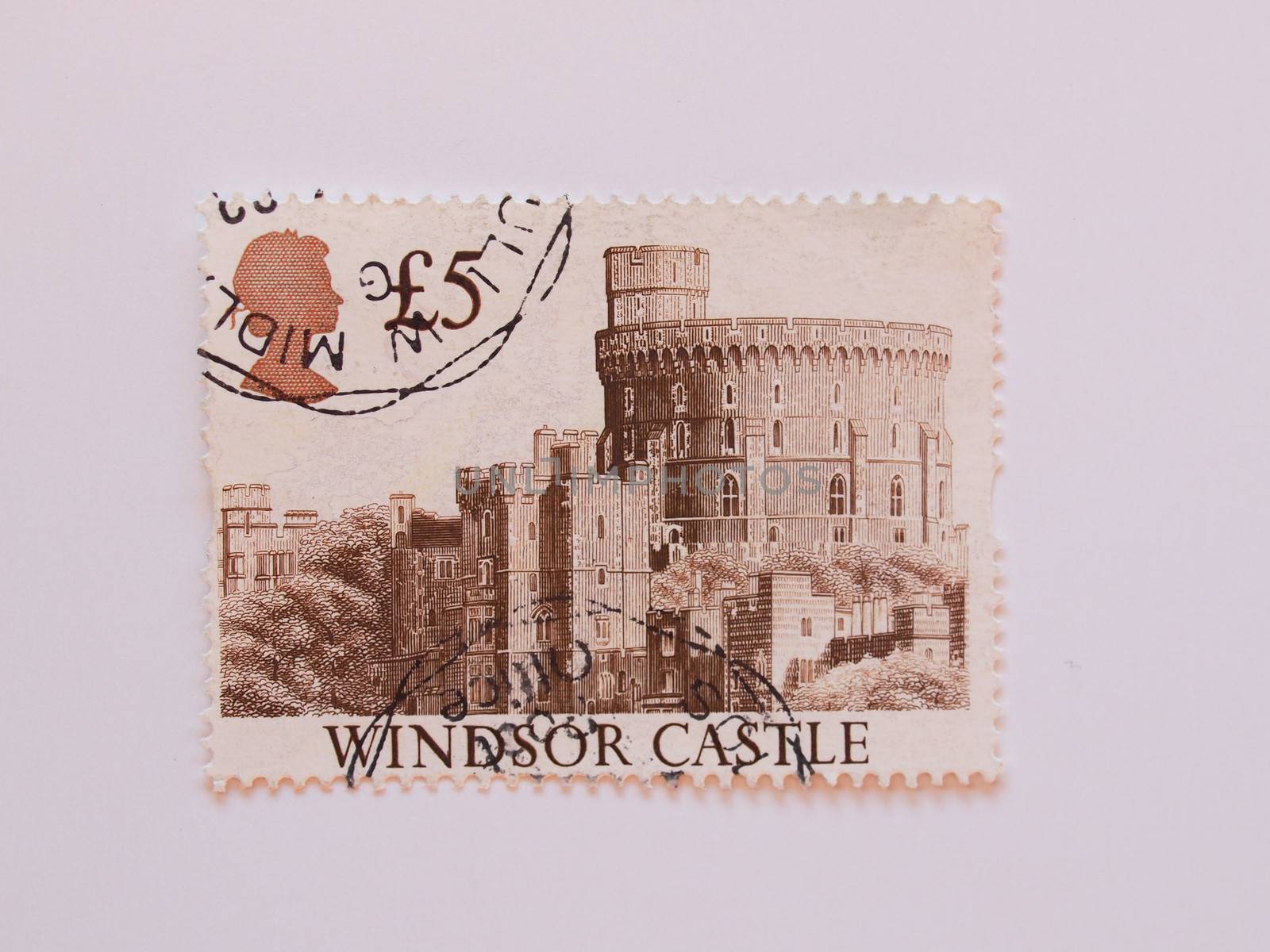 UK, CIRCA 1977 - Mail stamp bearing the Royal Castle of Windsor, released in the UK circa 1977