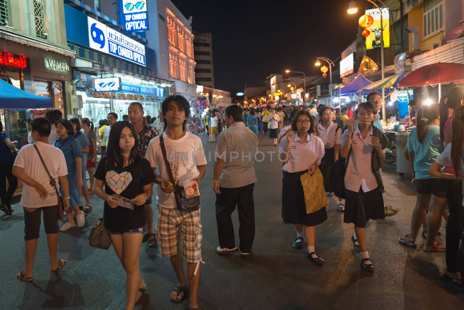 PHUKET, THAILAND - 07 FEB 2014: Unidentified people walk on central pedestrian street during annual old Phuket town festival at night. 