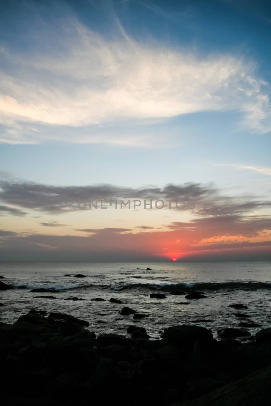 Calm sunset over ocean by juhku