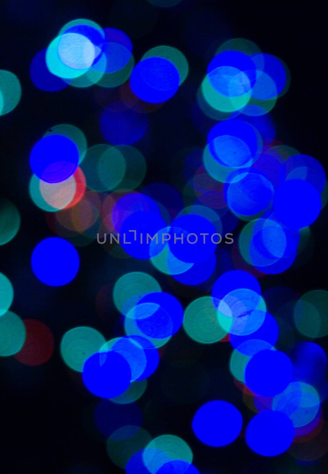 Glitter of color christmas lighting background.