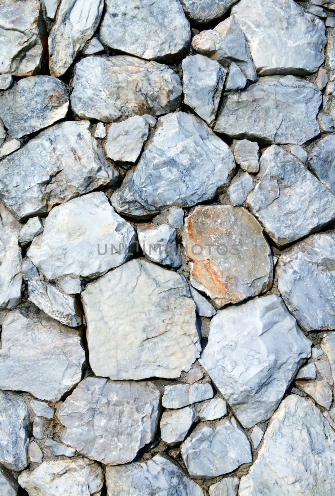 Closeup of stone wall  by opasstudio