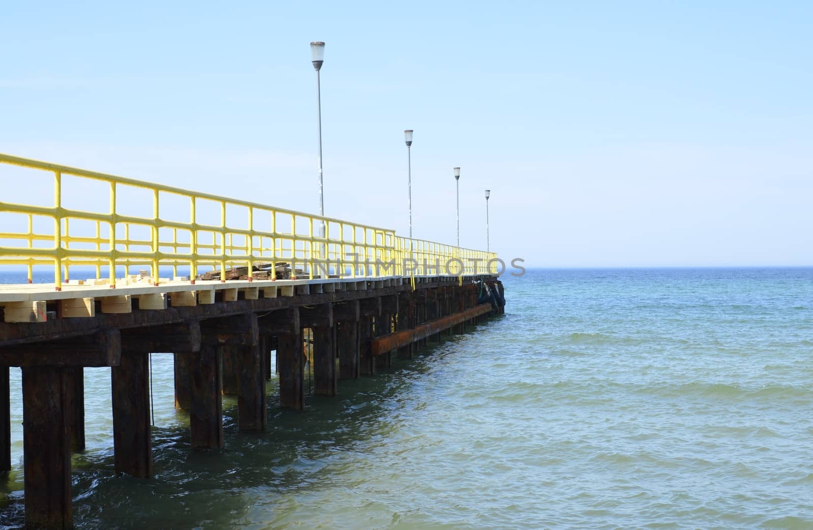 Pier at Baltic Sea by fstockluk