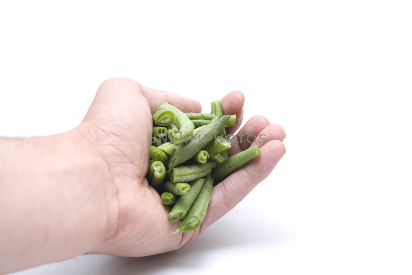 Fresh Green Stick Beans in the Hand