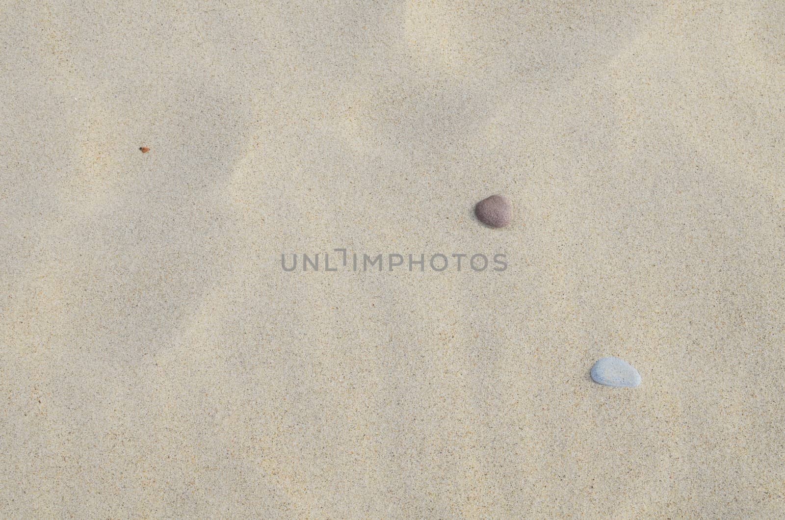 Little Rocks on Sandy Beach