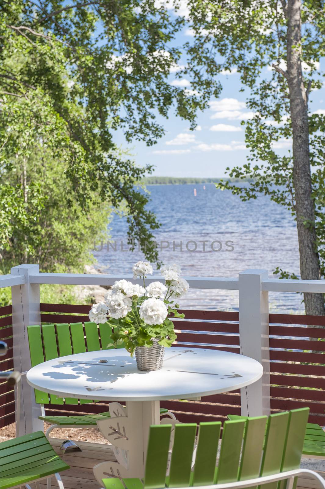 Summer terrace decorated with flowers, taken in Finland