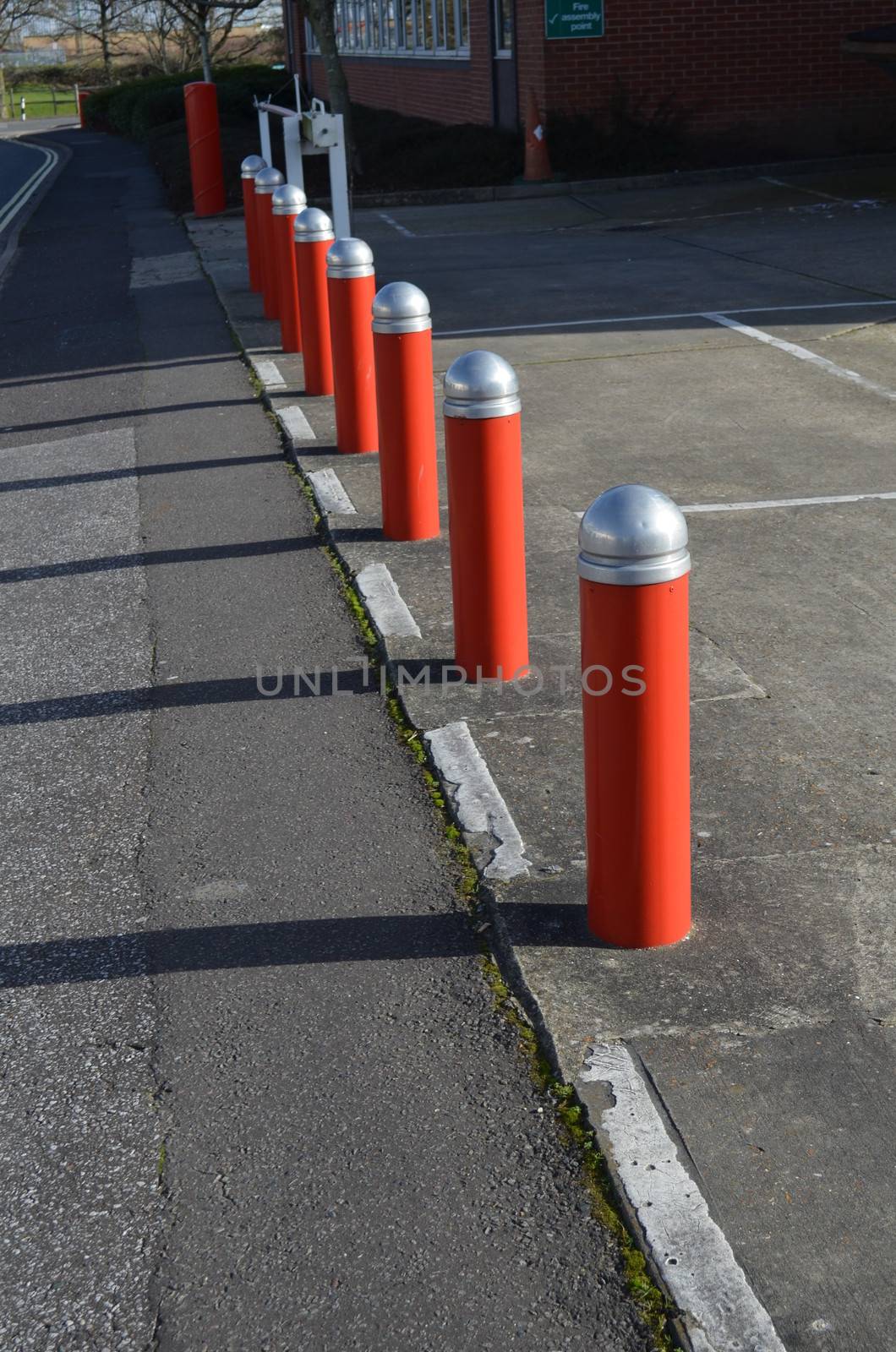 Steel security bollards in front of buildings to prevent crime and terrorism threats.