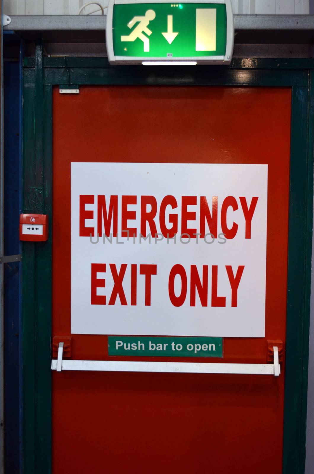 Emergency Exit sign on a fire door.