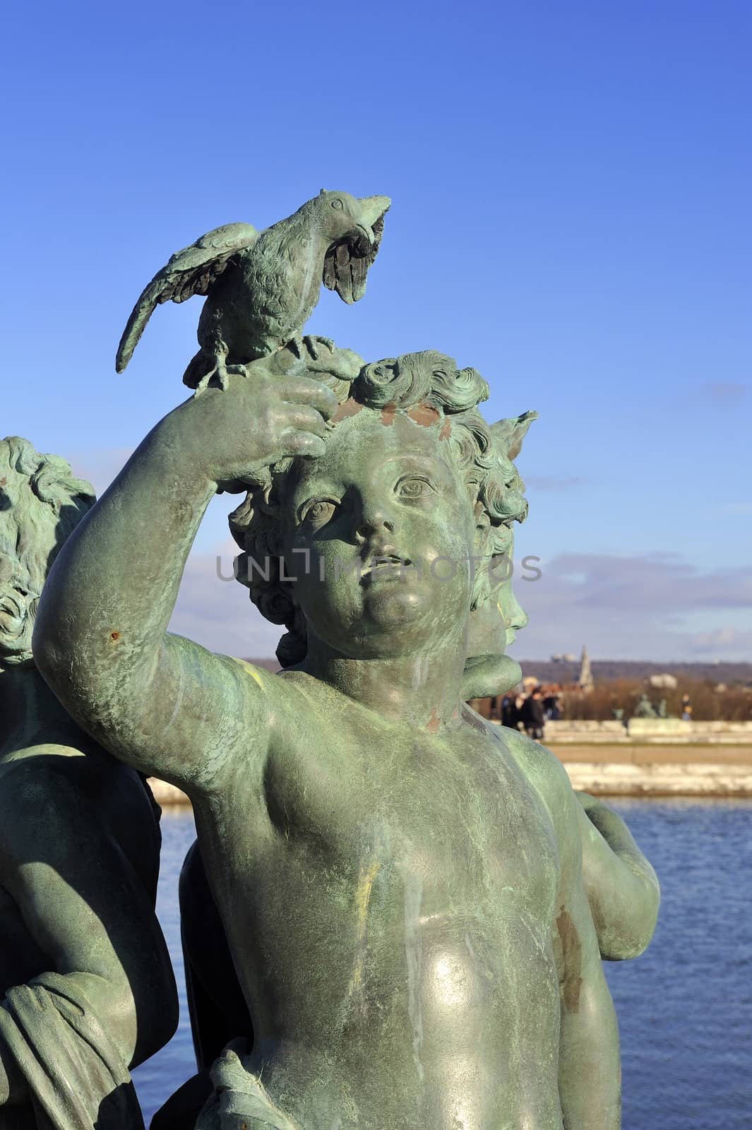Park of the castle of Versailles sculpture reflecting pool