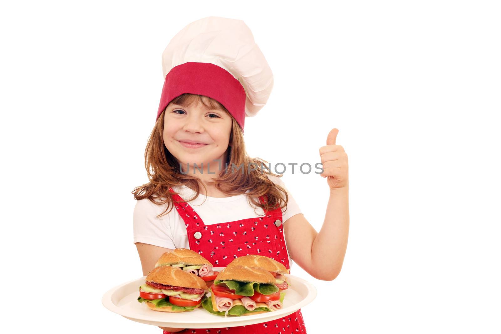 happy little girl cook with sandwiches and thumb up by goce