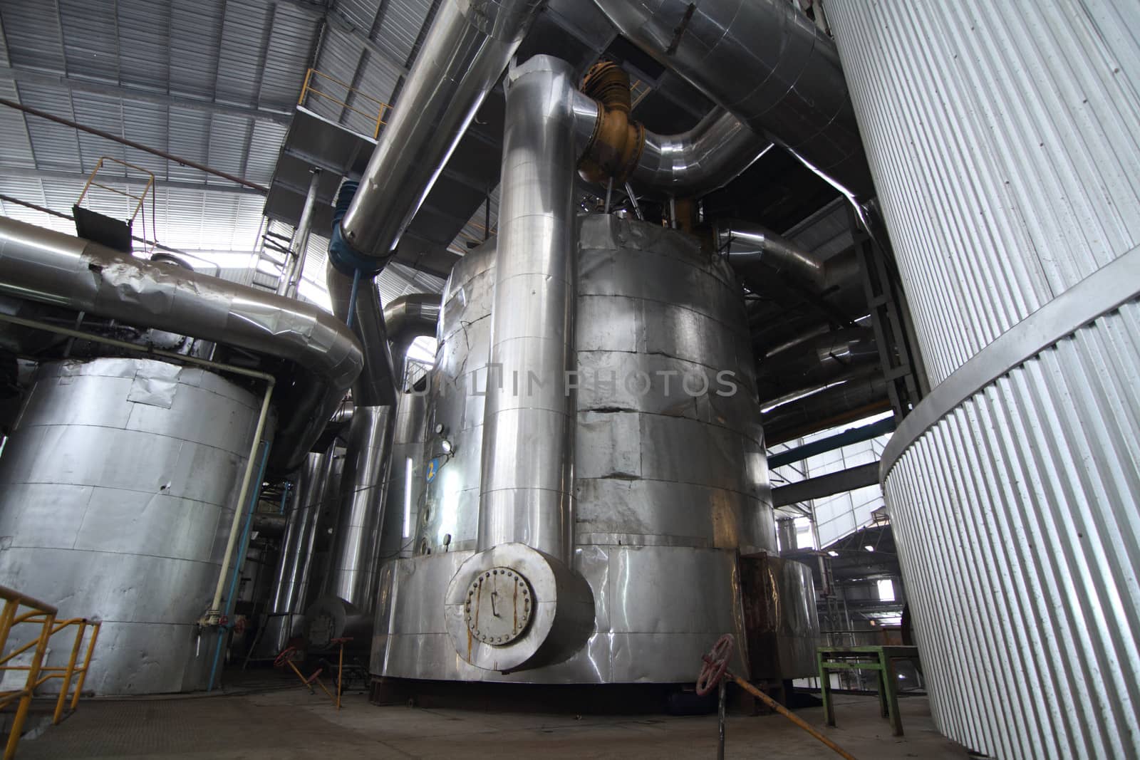 evaporator tanks in a sugar mill