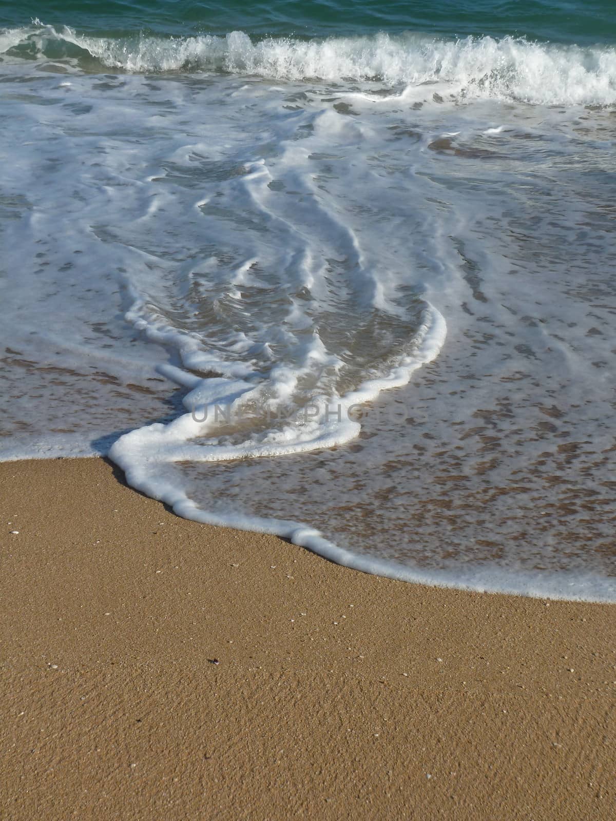 Wave pattern on the beach at Huatulco, Mexico