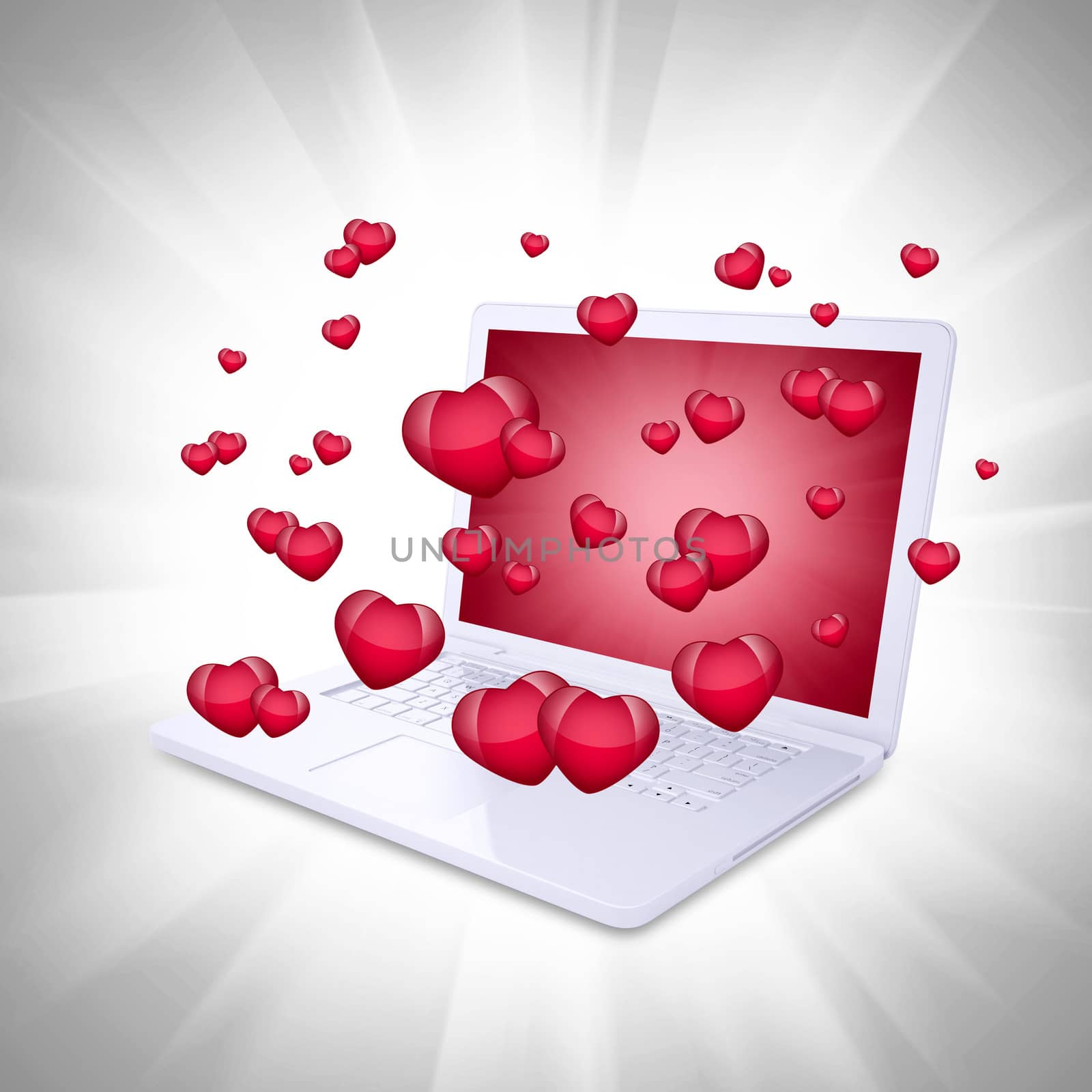 Red hearts fly out of the laptop. Computer technology concept on Valentine's Day