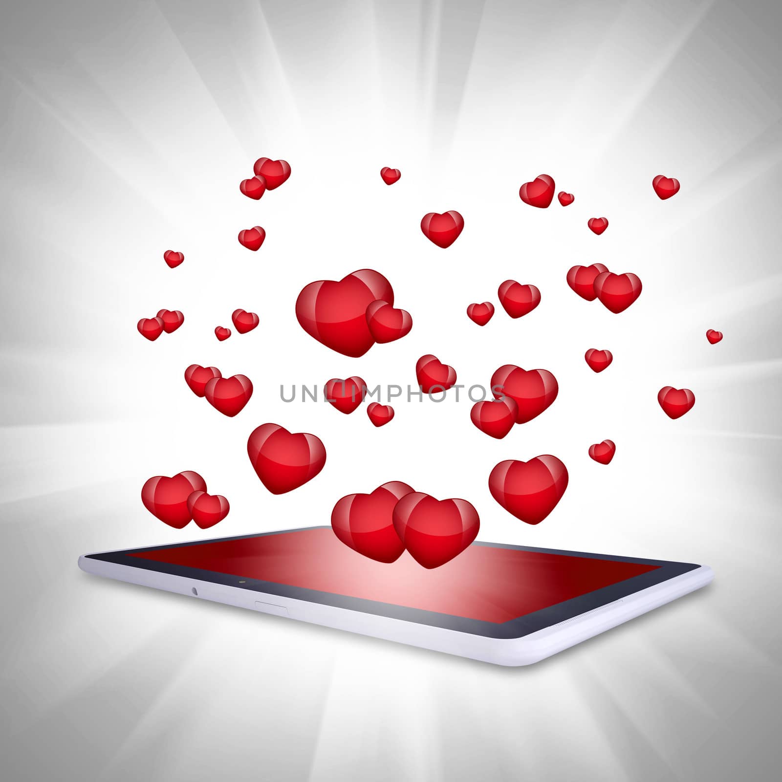 Red hearts fly out of the tablet PC. Computer technology concept on Valentine's Day