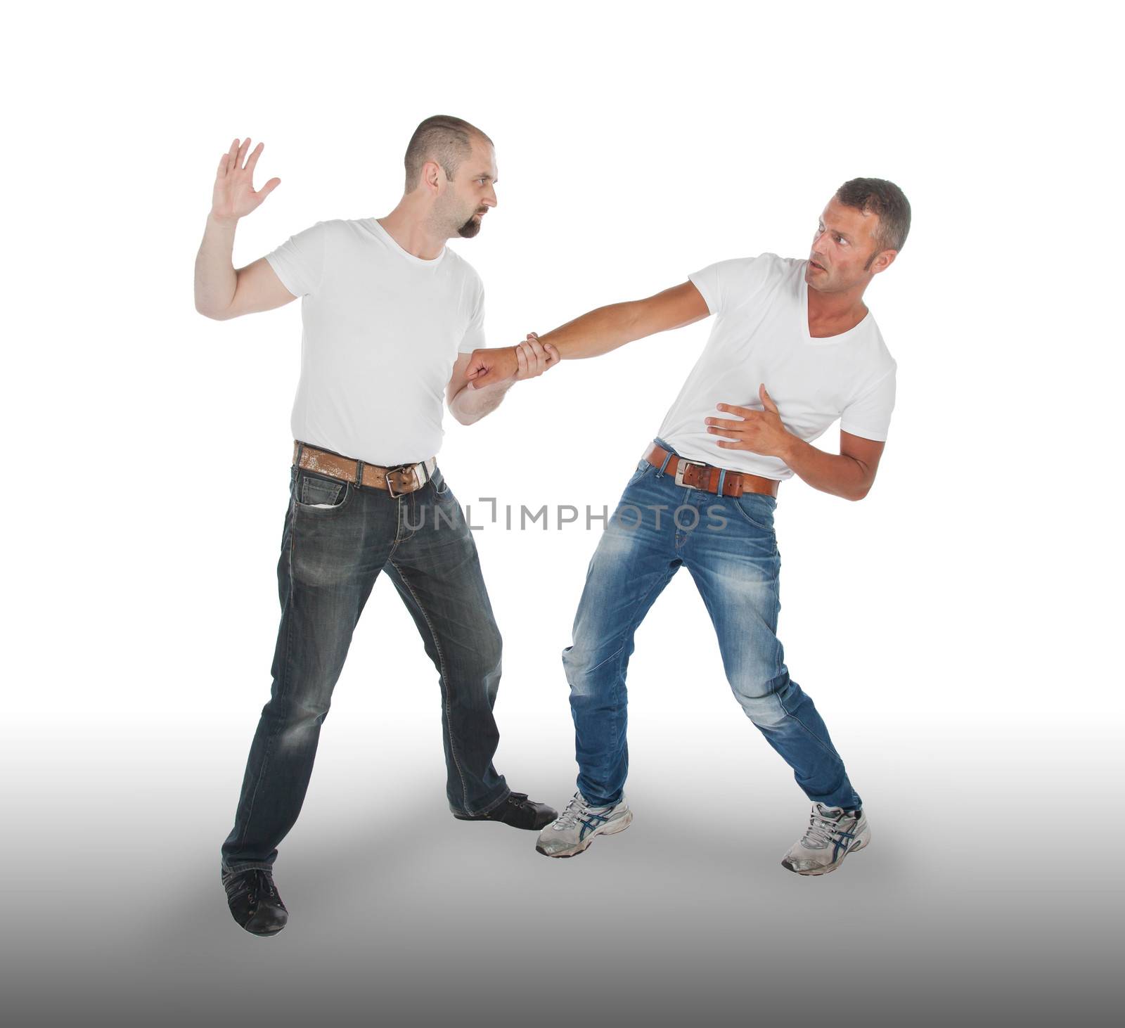Man attacking other man, isolated on white