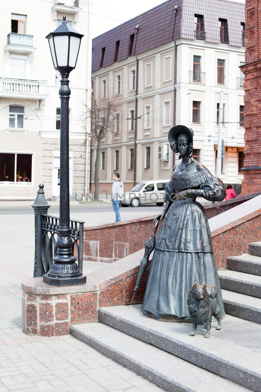 Statue of lady with small dog in Mogilev in Belarus
