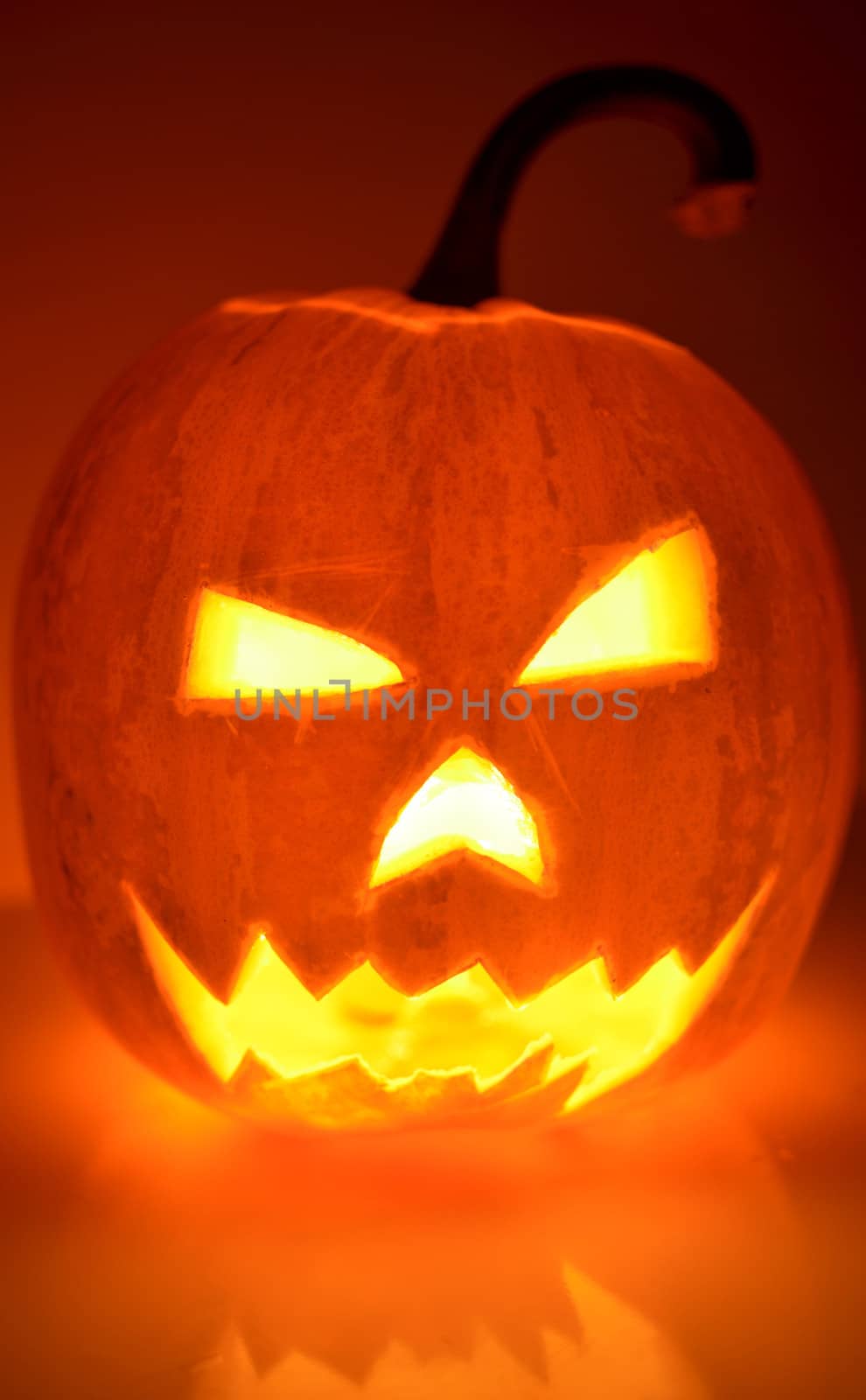 Halloween Pumpkin Head Glowing From Inside in The Dark