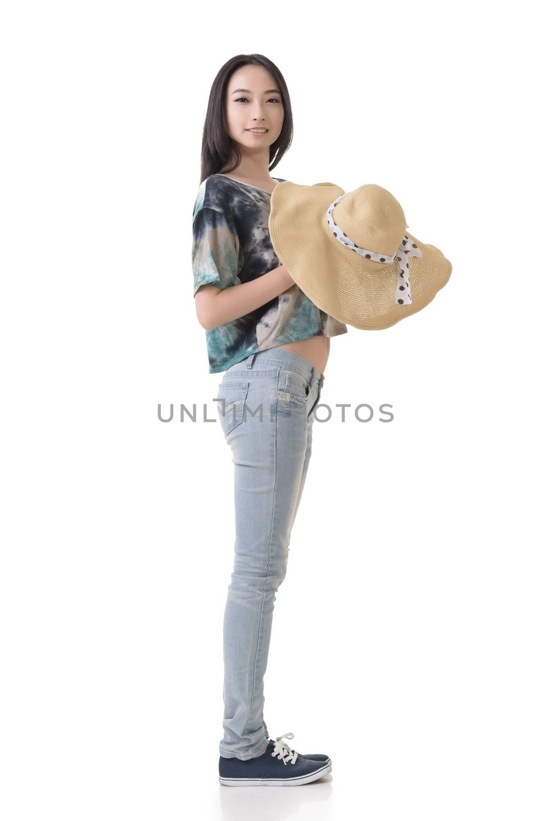 Asian beauty with hat, full length portrait isolated on white.