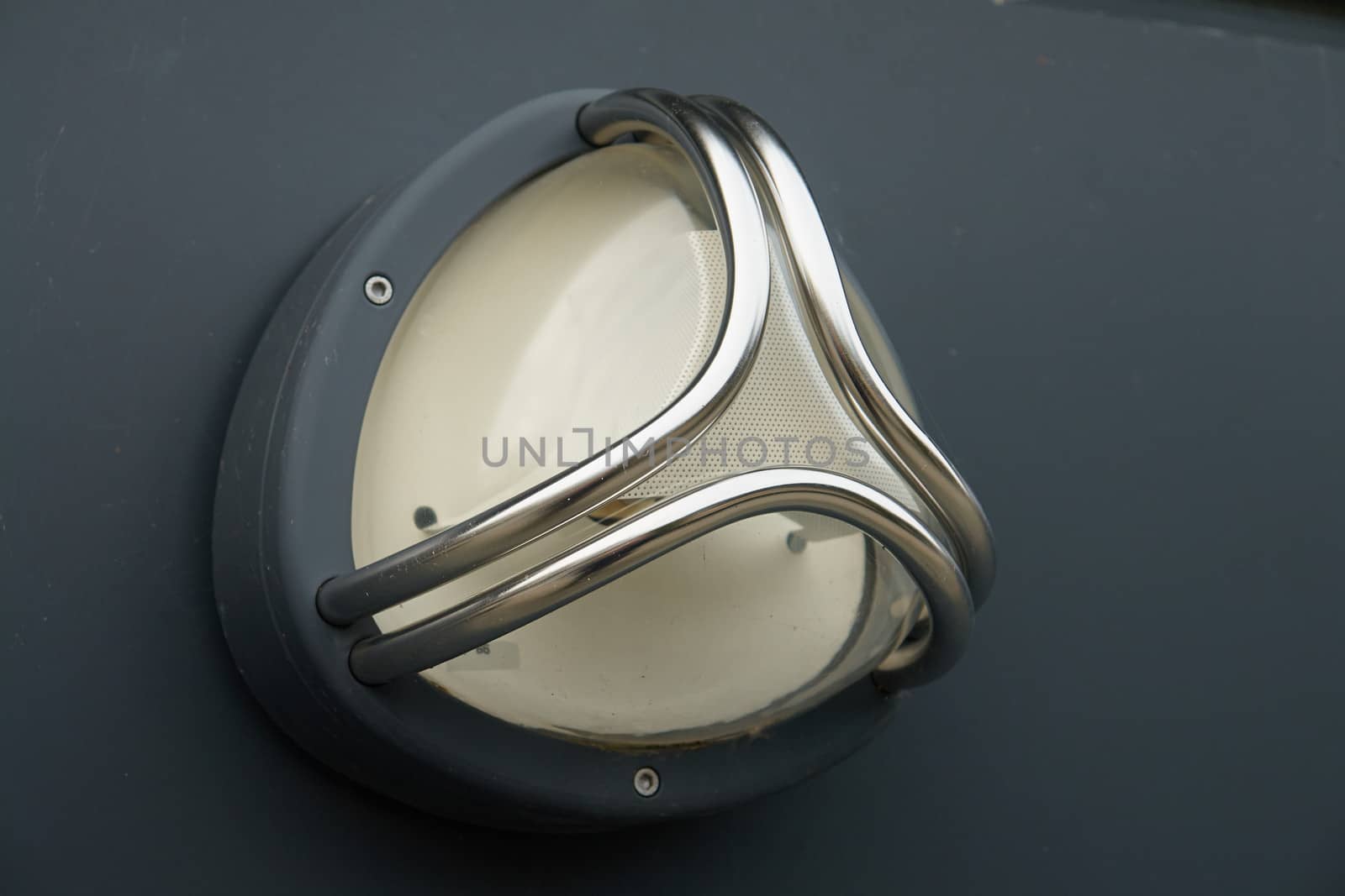 Closeup details of a metal modern design pathway light wall lamp                               