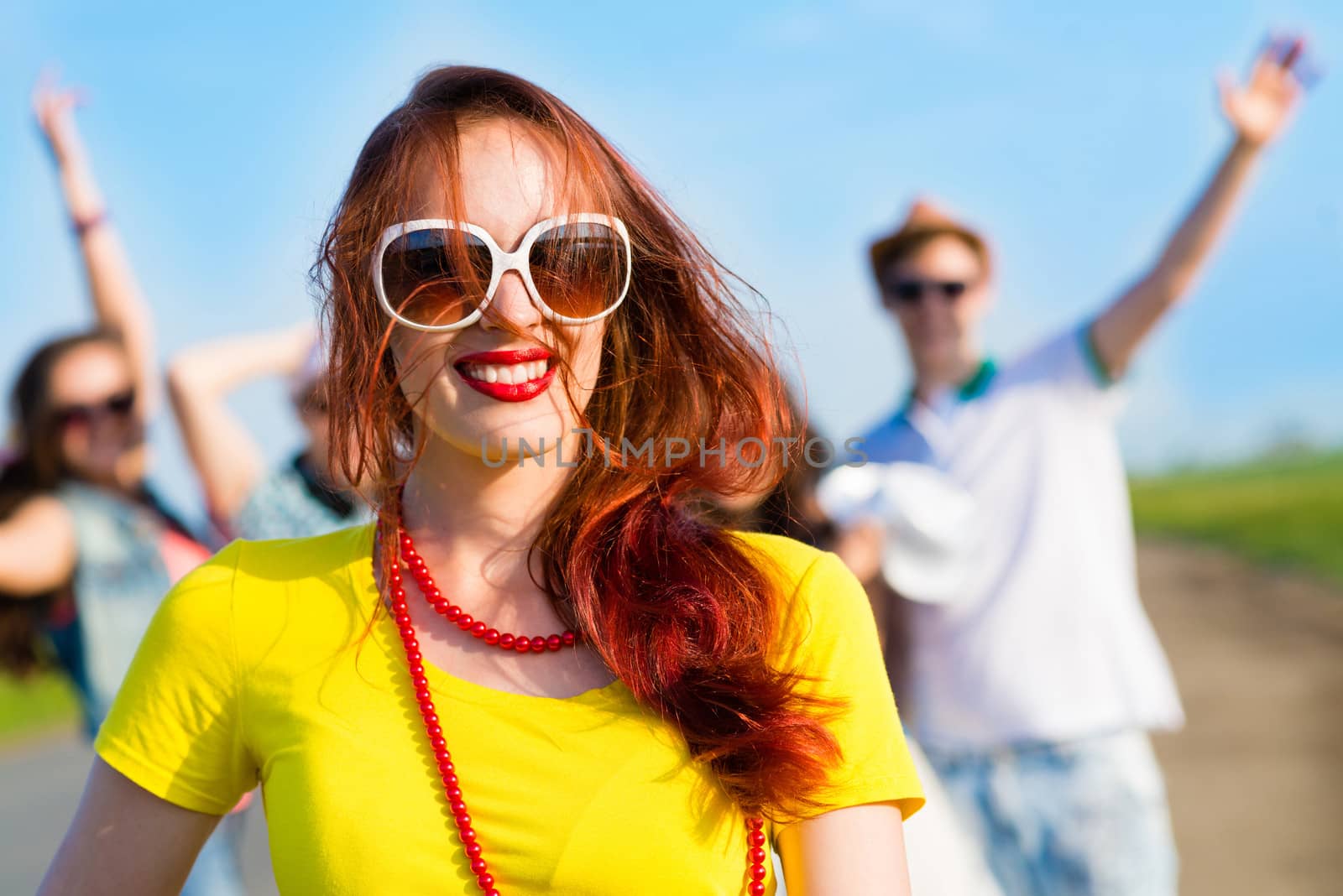 stylish young woman in sunglasses by adam121