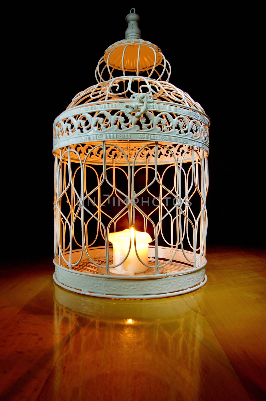 Candle in a cage