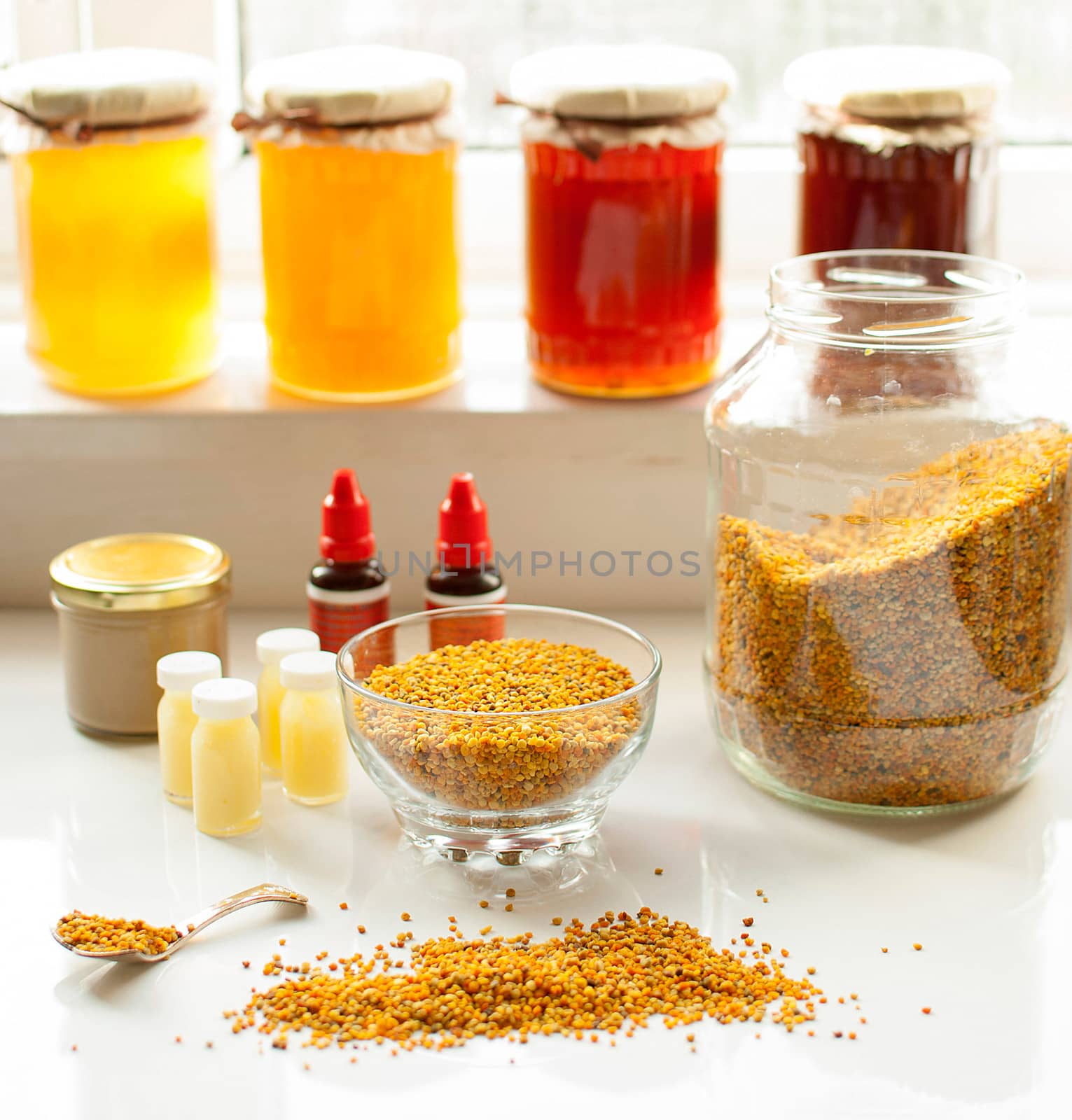 variety of raw organic honey bee products