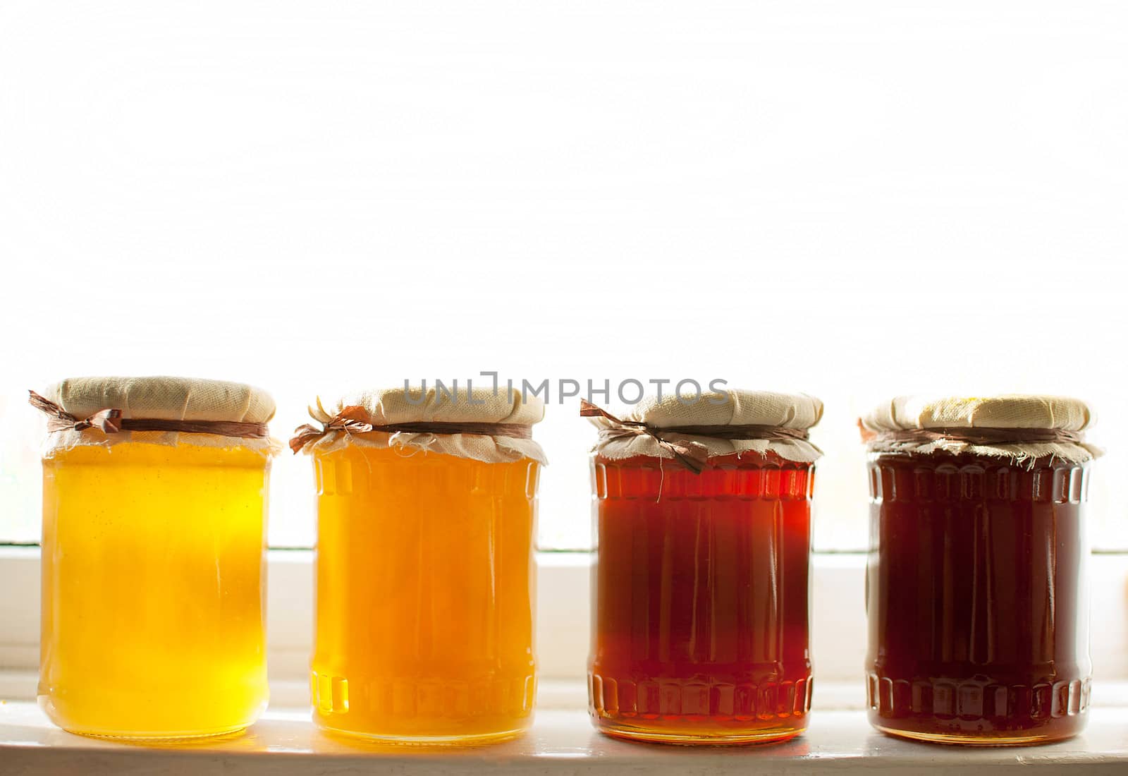 variety of raw organic honey bee products