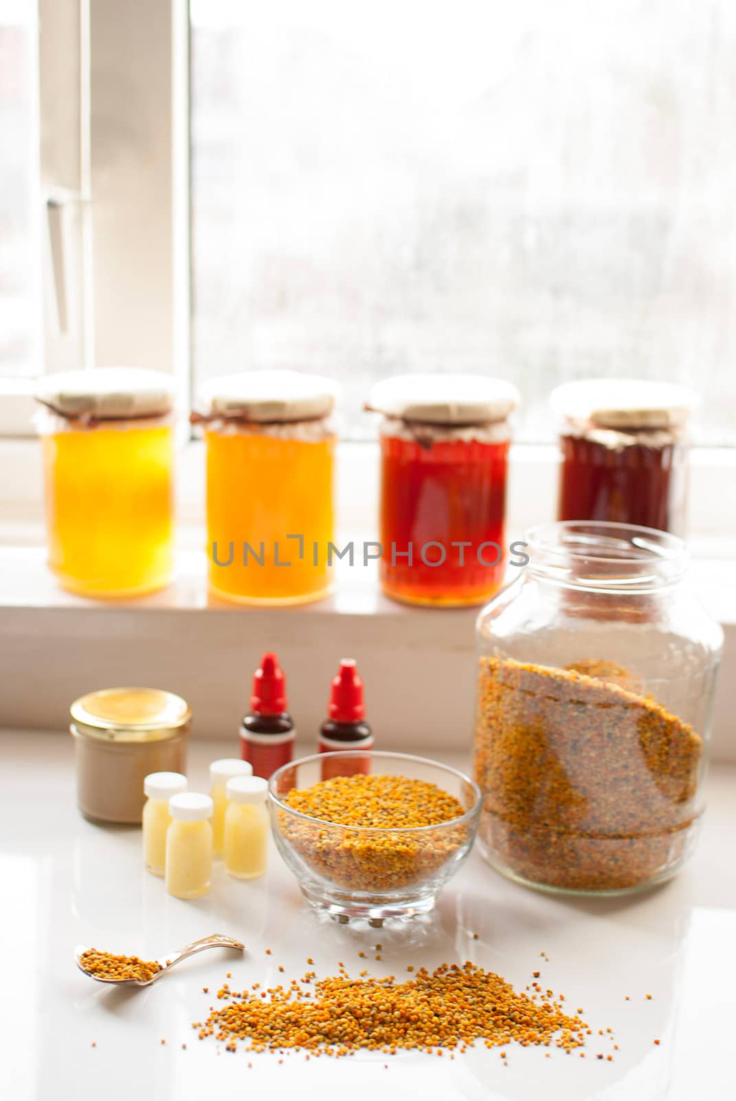 variety of raw organic honey bee products