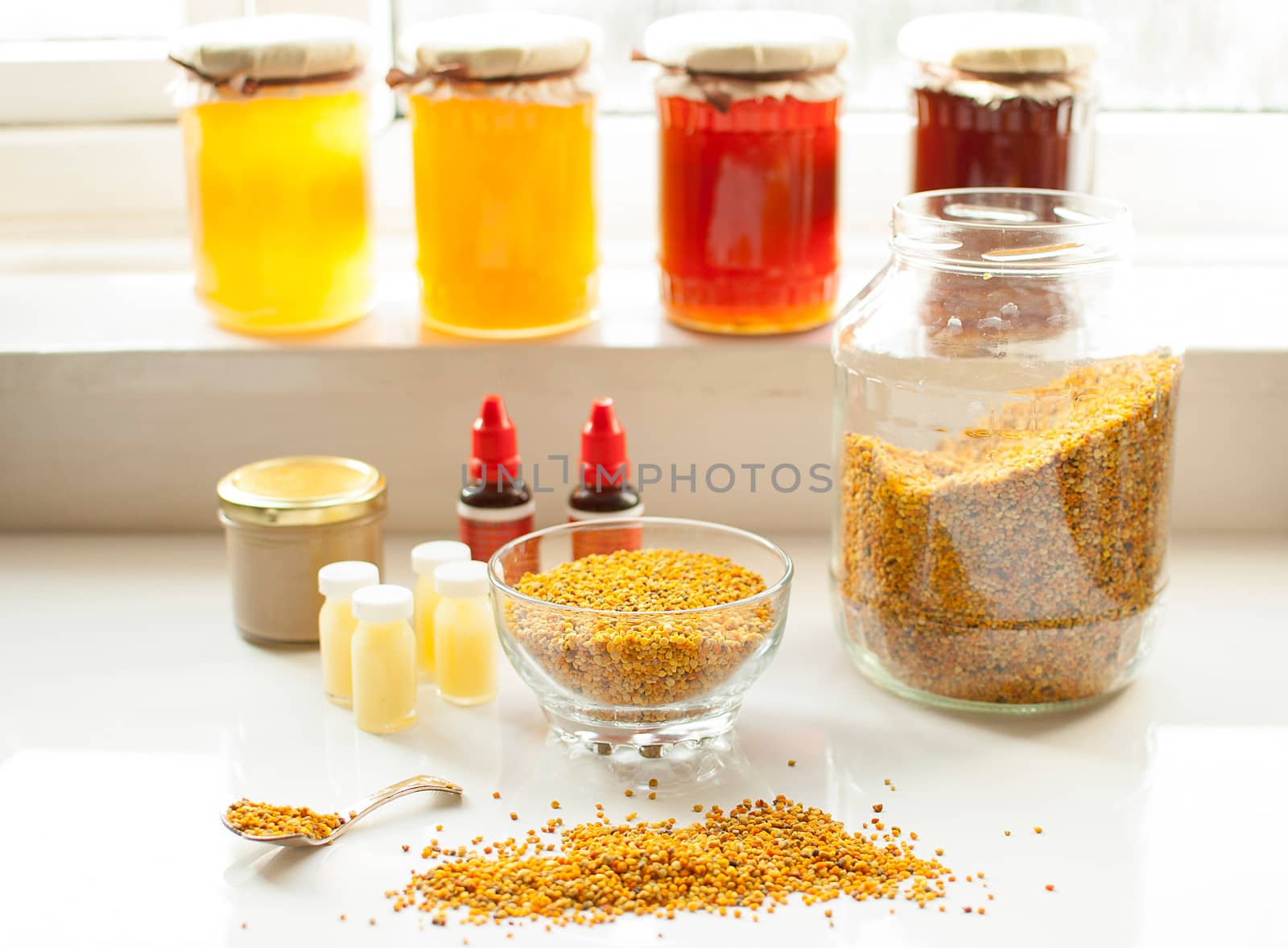 variety of raw organic honey bee products