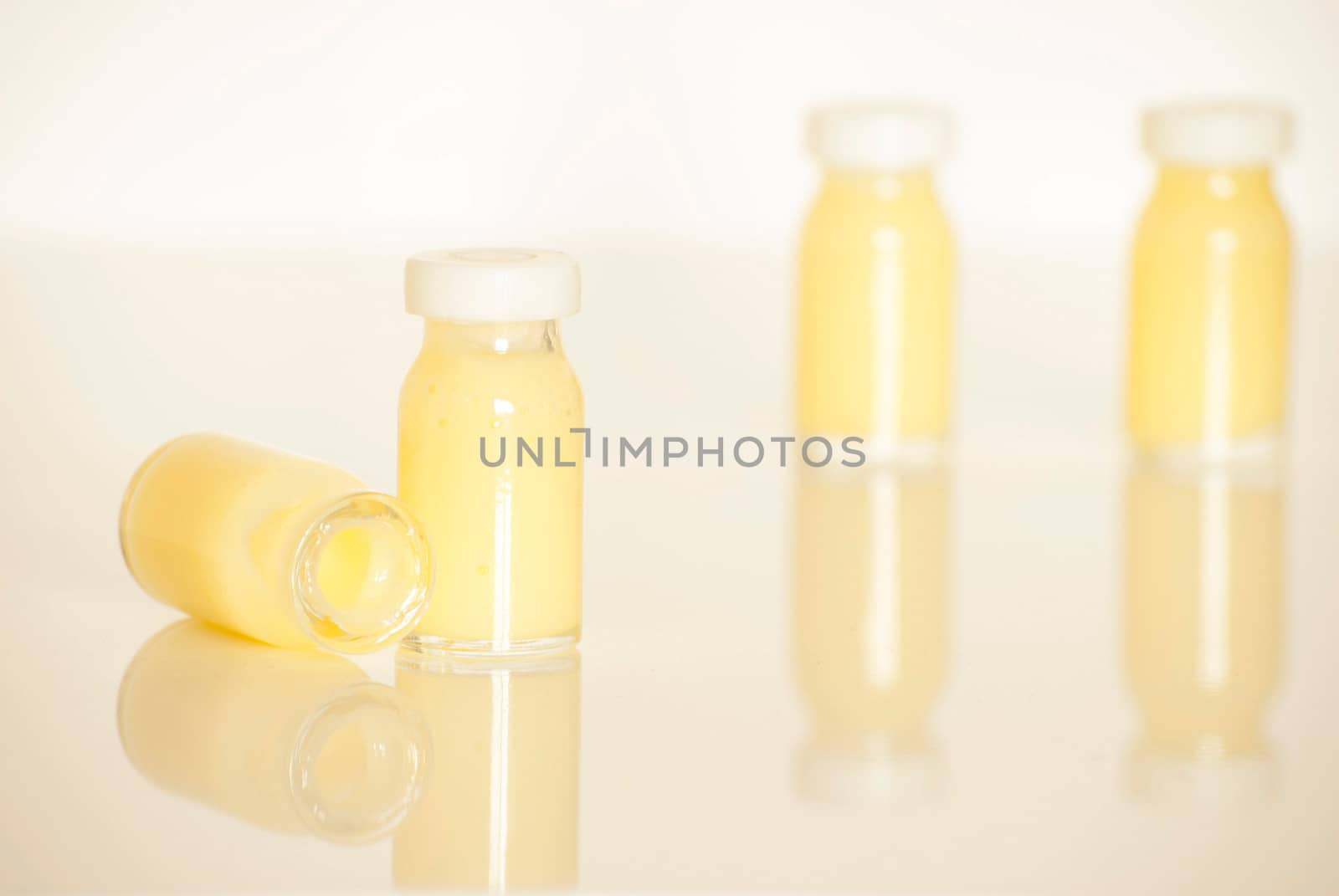 raw organic royal jelly in a small bottle