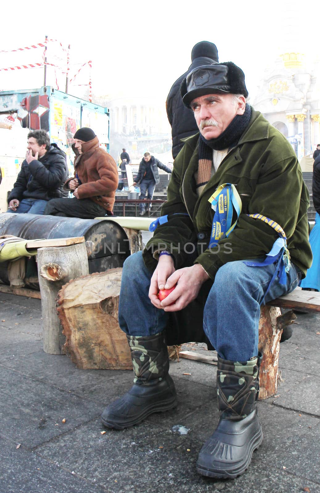 KIEV, UKRAINE - DECEMBER 24: Unidentified man during anti-governmental and pro-European integration protests on December 24, 2013 in Kiev, Ukraine