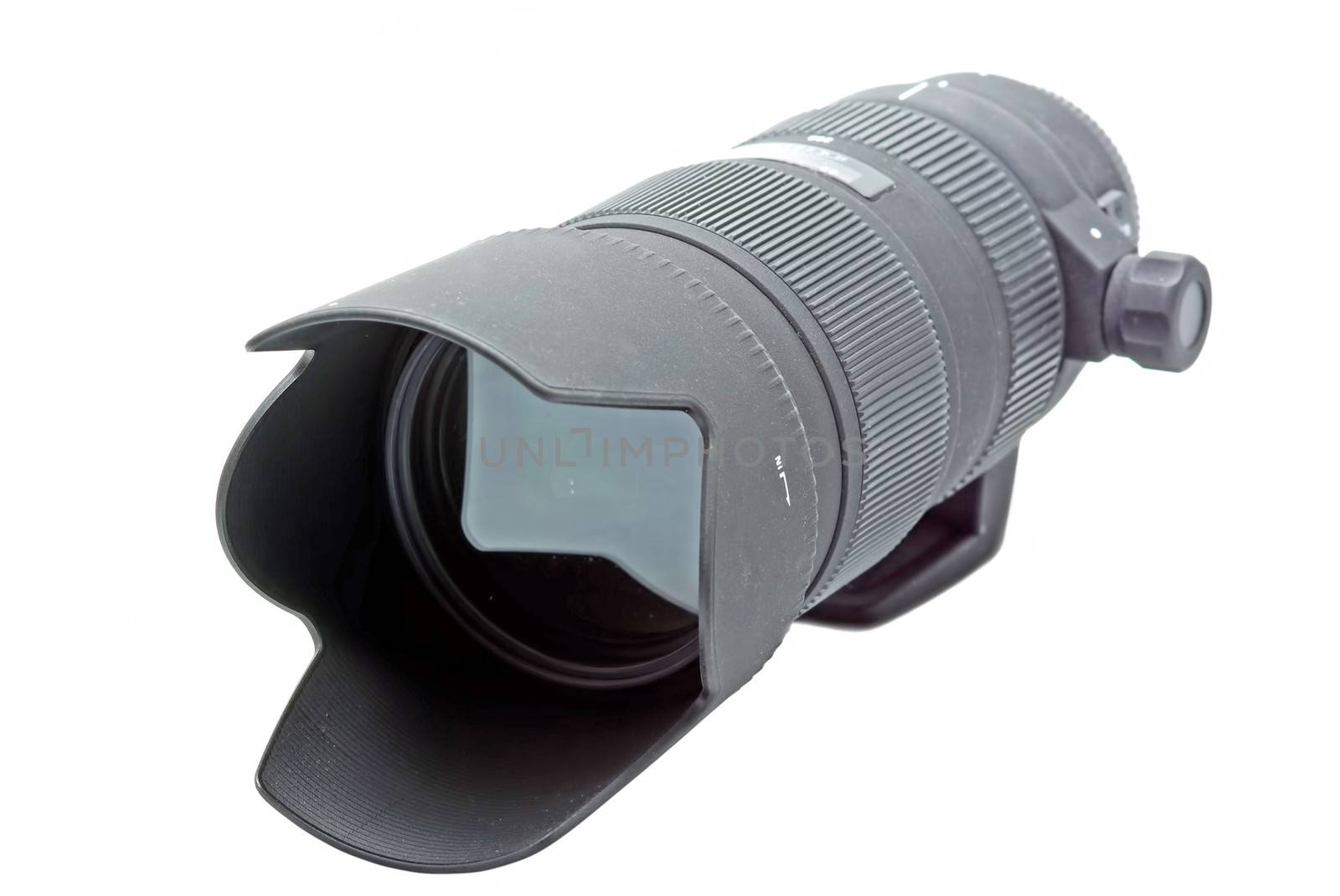 Zoom telephoto lens for DSLR camera on white