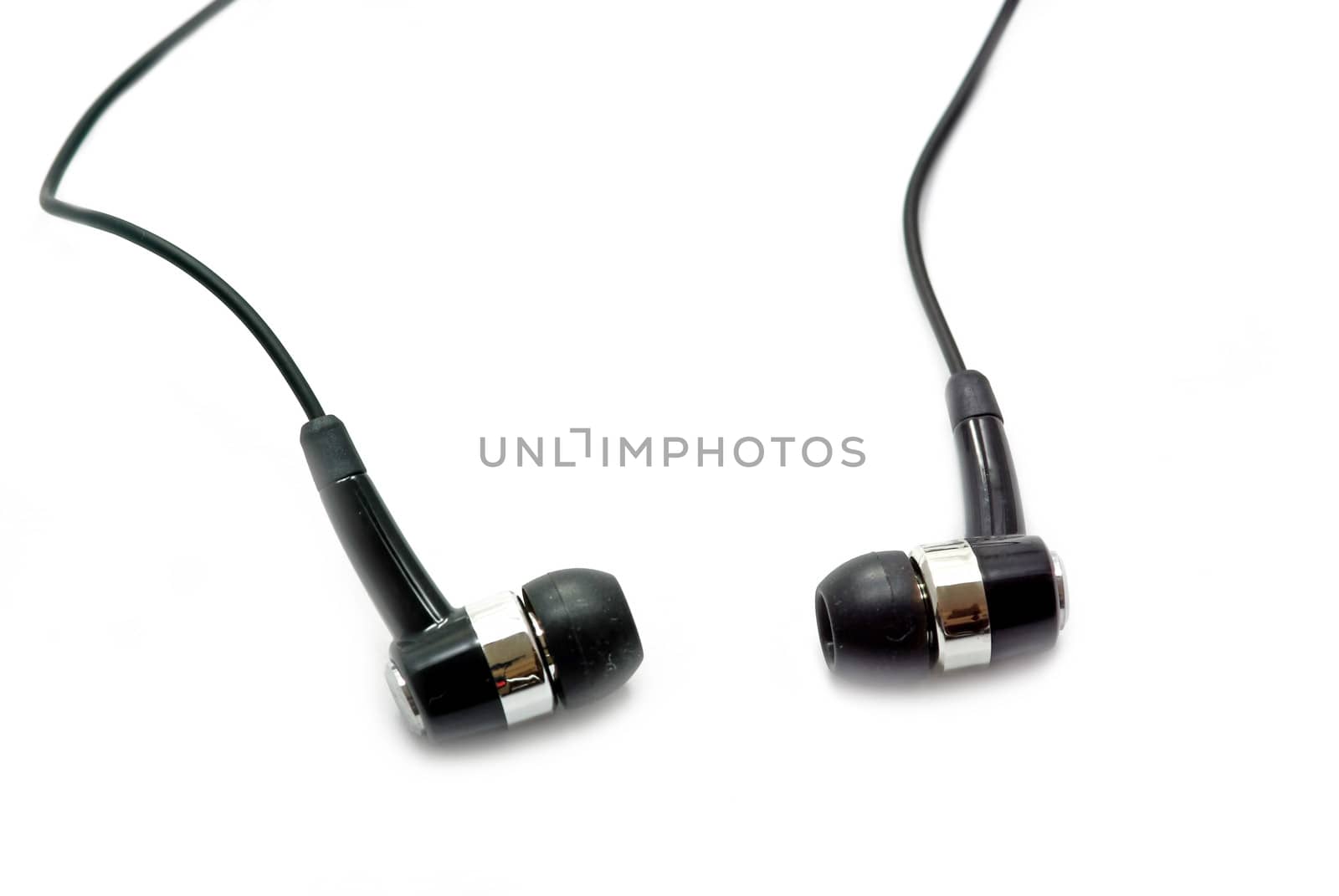 Two black earphones isolated on a white background