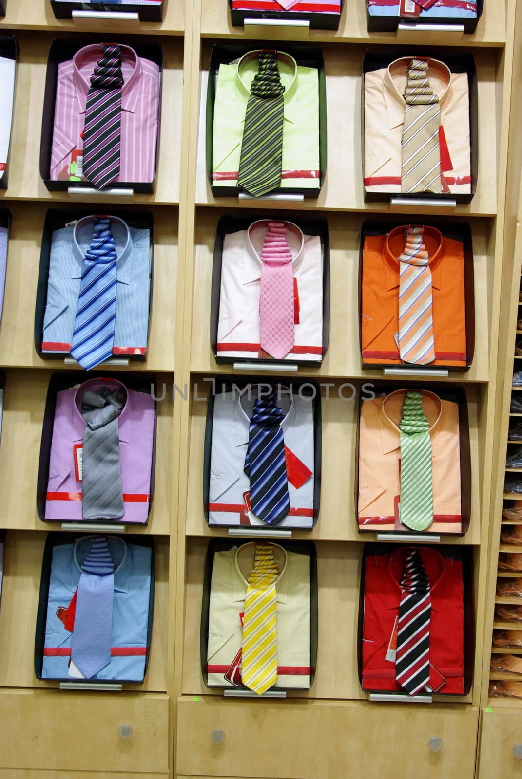 Colorful shirts with necktie in a shop.