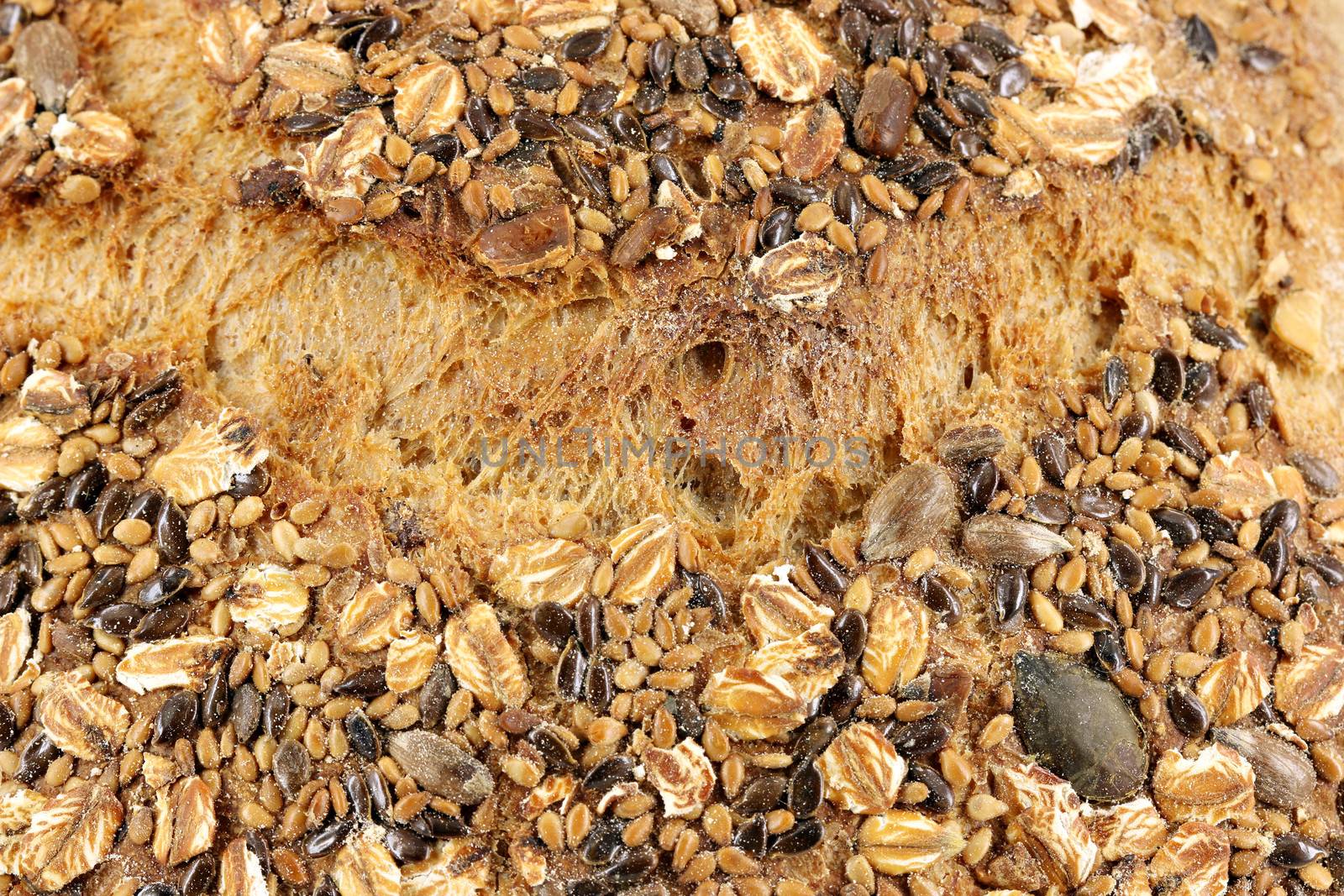 bread with seeds detail food background by goce