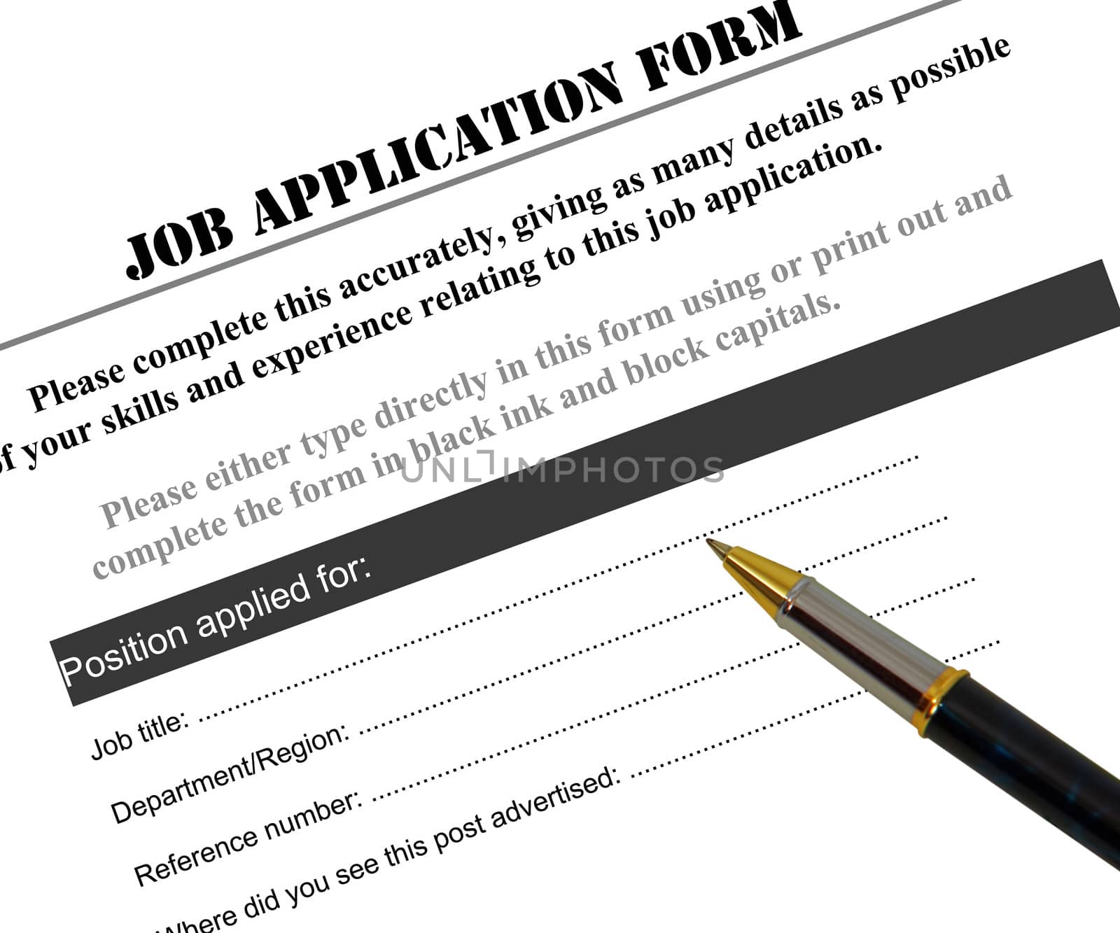 Completing a job application form with pen