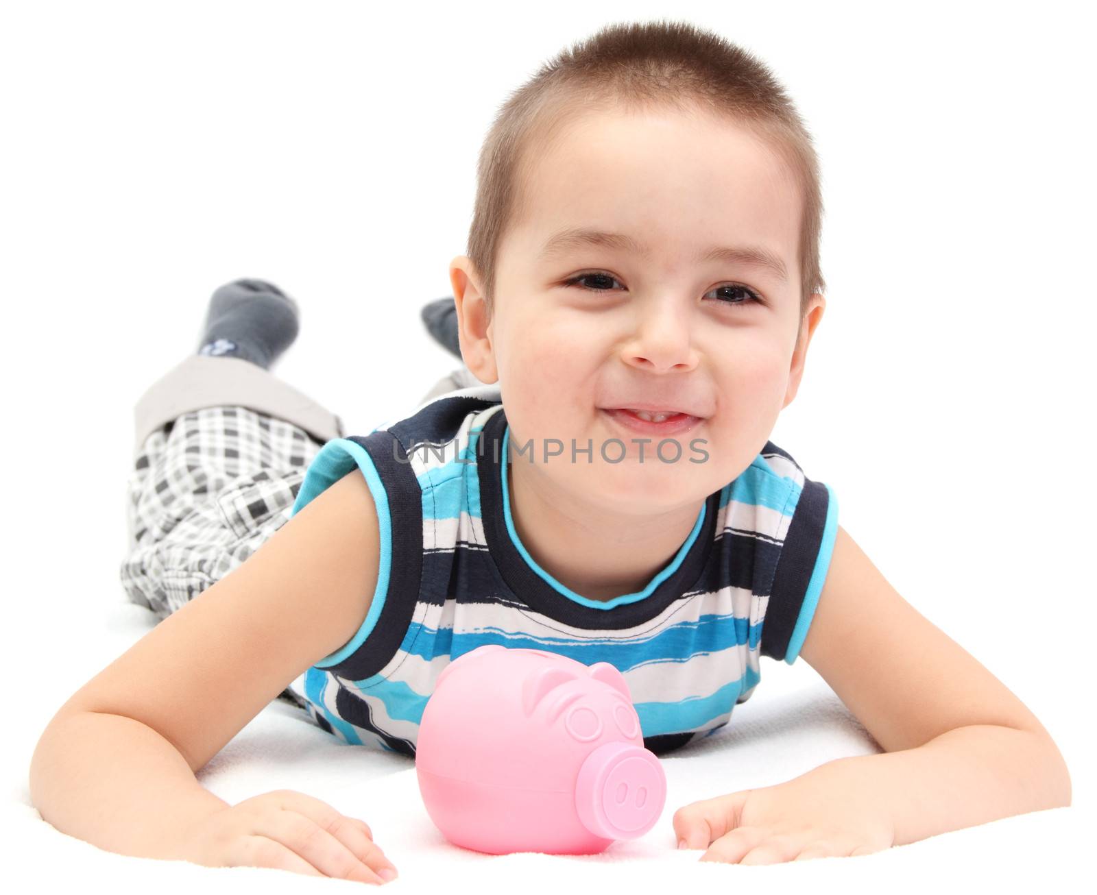 happy child with piggy bank by NikolayK