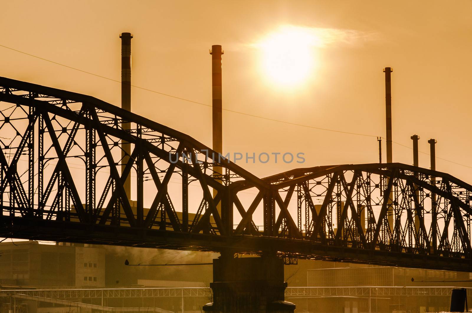 Bridge and industrial buildings on late Afternoon